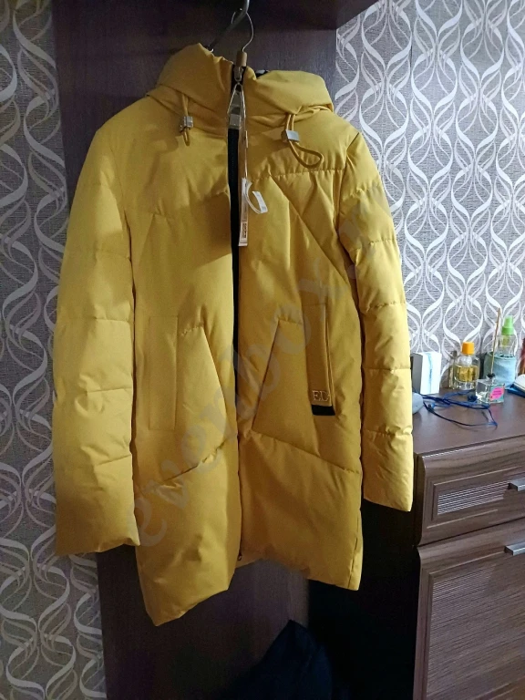 Продаю пуховик