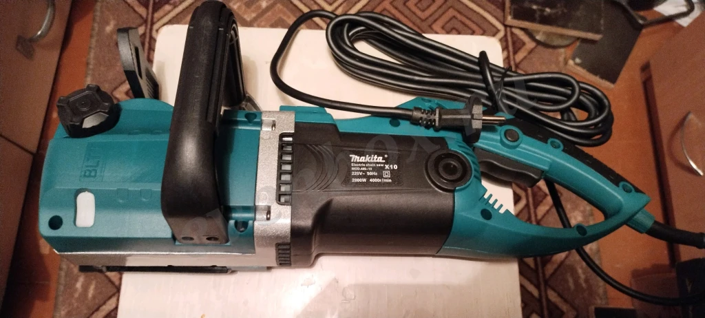 Электропила макита