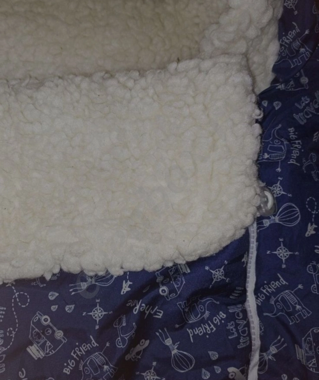 Тёплый конверт на овчине.