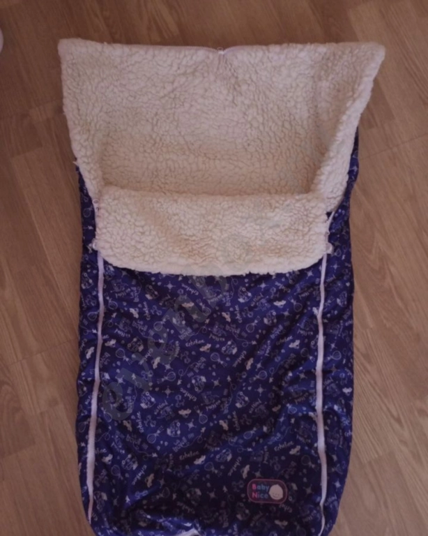 Тёплый конверт на овчине.