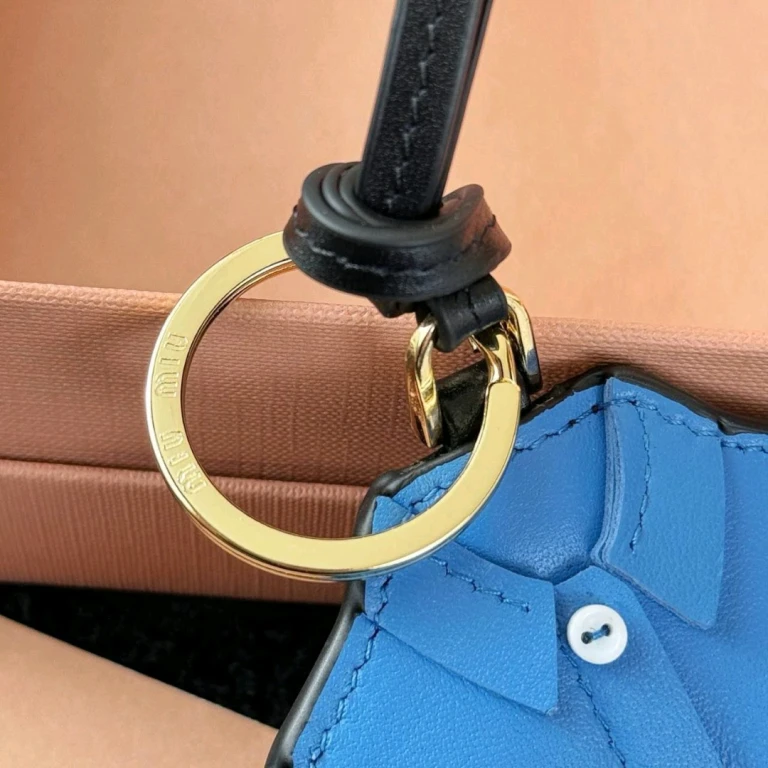 Брелки Miu Miu