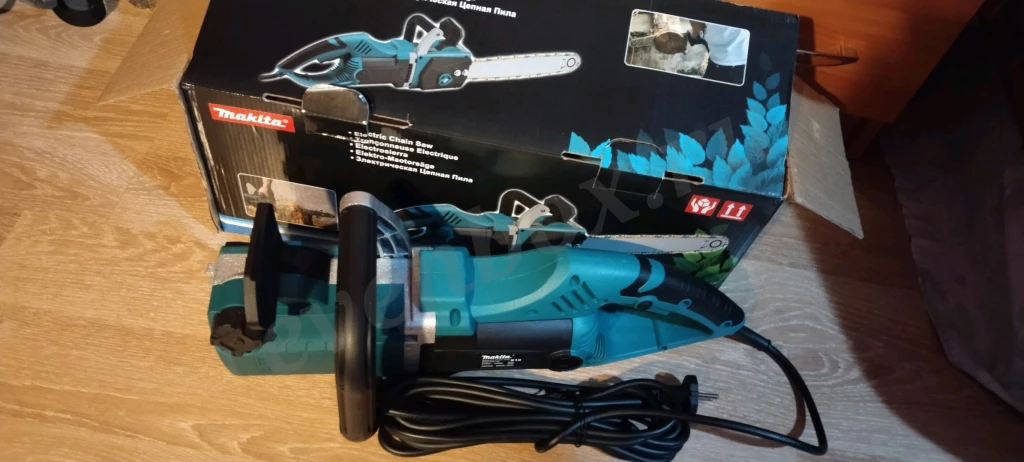 Электропила макита